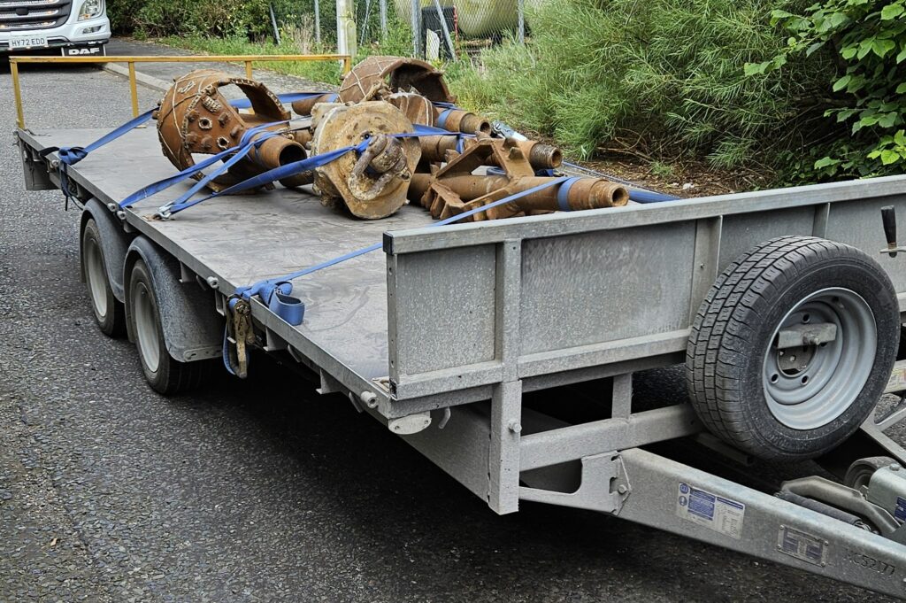 Drill heads being transported on a trailer