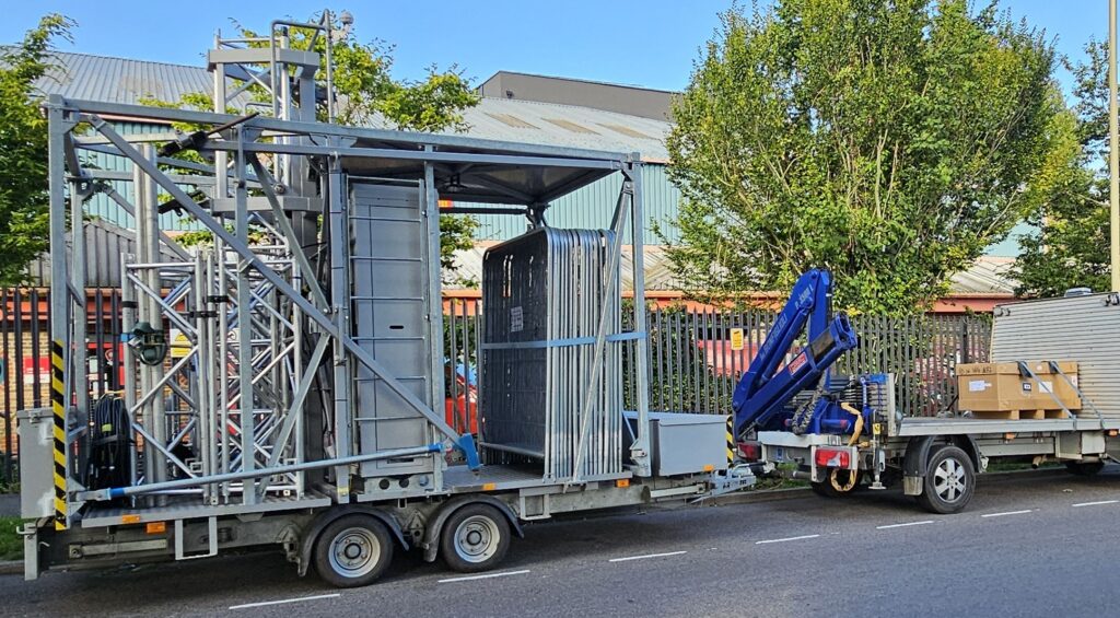 Transporting a self contained communications trailer