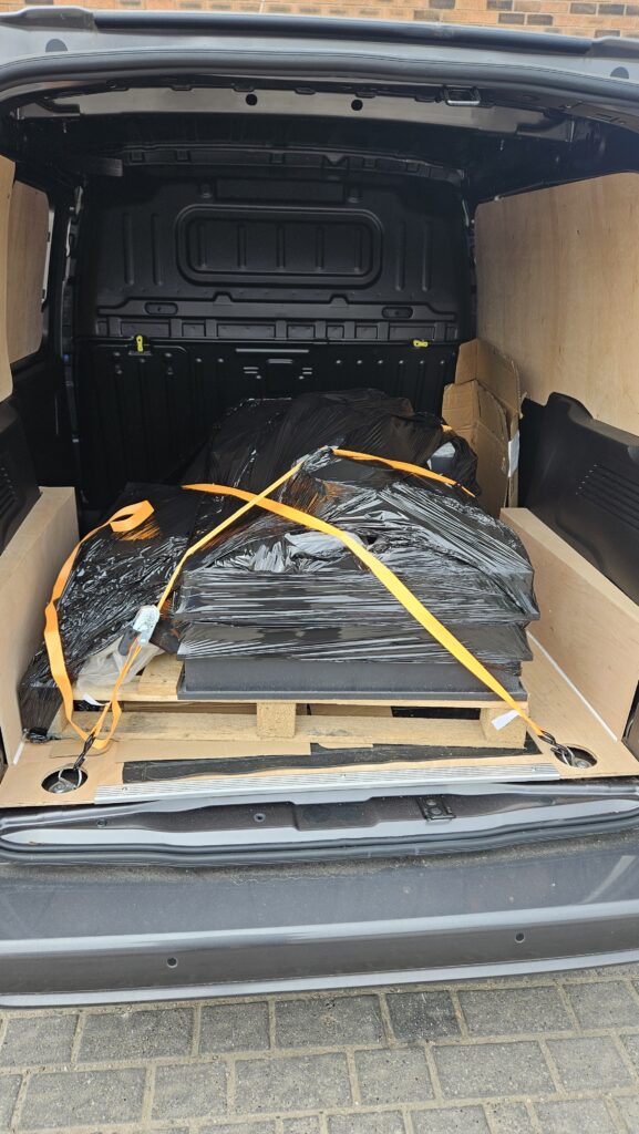 Pallet of items from a building merchant loaded for same-day courier delivery