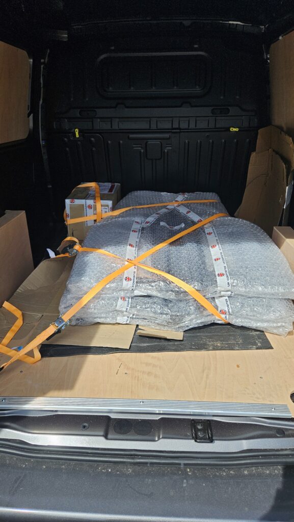 Delicate composite parts secured in the back of the CamTro Transport van